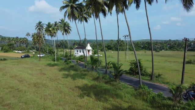 drone shots of Dear Zindagi Raod known as the Parra coconut tree road, in North Goa. 