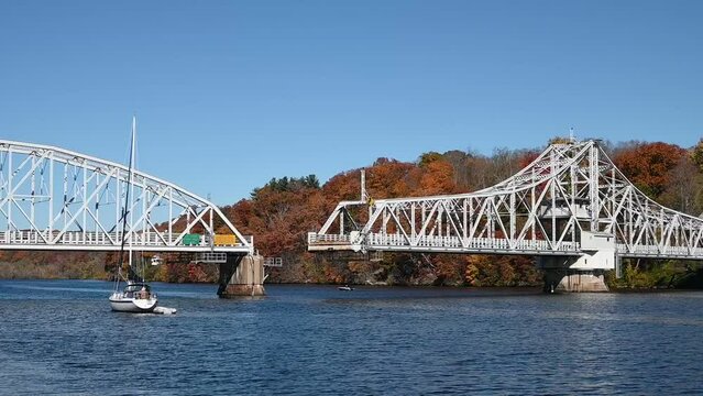The East Haddam Swing Bridge opens to let boat traffic pass through on the Connecticut River. The bridge was built in 1913 to connect the town of Haddam and East Haddam, Connecticut over Rt. 82. 