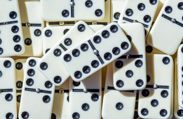 Set of classic domino tiles close-up. Board game for the whole family, entertainment and competitive board game