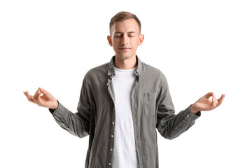 Young man meditating on white background