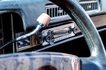 Color detail on the headlight of a vintage car