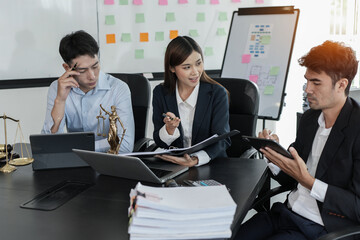 Lawyers having  Concepts of  Legal services at the law office work Legal advice online on computer...