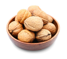 Bowl of walnuts on white background