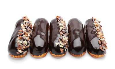 Delicious eclairs in chocolate glaze isolated on white background