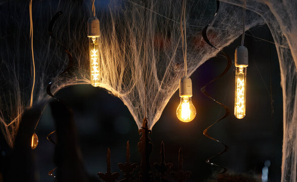 Halloween decorations from light bulbs and cobwebs....