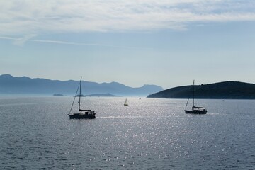 Few sailboats in the calm Adriatic sea, Korcula, Croatia