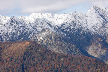 Beautiful autumn landscape in the Caucasus mountains. Golden autumn. Colorful forest on the slopes...