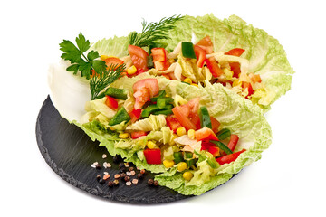 Green lettuce salad with fresh vegetables isolated on white background.