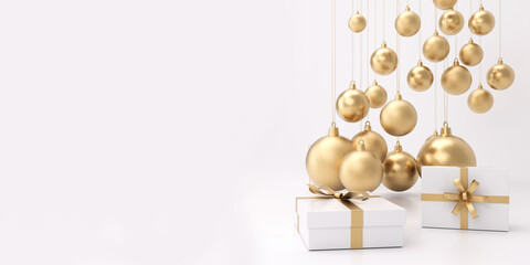 Obraz premium Hanging golden Christmas ball and gift boxes.