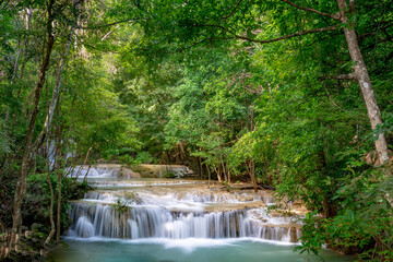 Beautiful waterfall in the forest at Erawan waterfall National Park, Thailand