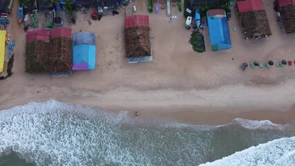 Goa, India 19th October 2022: 4k drone shots of the Calangute Beach in North Goa. Calangute is also famous for its water sport activities. A belt of 4 beaches in Goa. Sea waves and beautiful oceans 