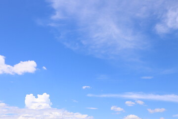 Obraz na płótnie Canvas Picture of white clouds bright sky open aura sun shining in gradient.