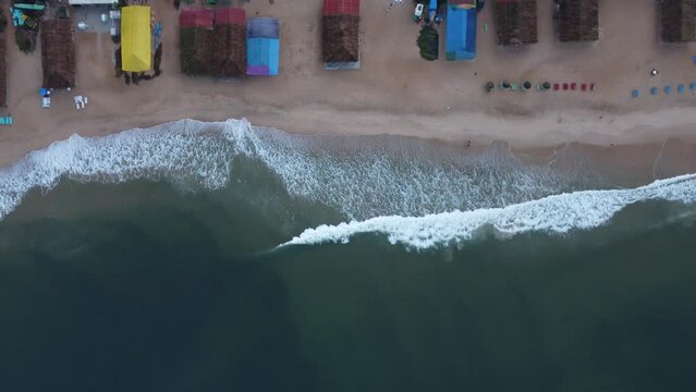 Goa, India 19th October 2022: 4k drone shots of the Calangute Beach in North Goa. Calangute is also famous for its water sport activities. A belt of 4 beaches in Goa. Sea waves and beautiful oceans 
