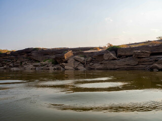 The big stone in the middle of the Mekong river.