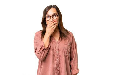 Middle-aged caucasian woman over isolated background having doubts and with confuse face expression