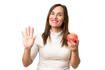 woman with apple over isolated background