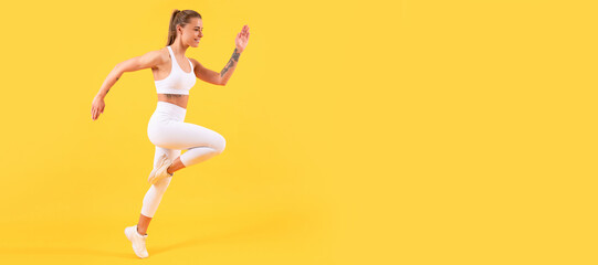 Fototapeta na wymiar fitness girl runner running on yellow background. Woman jumping running banner with mock up copyspace.