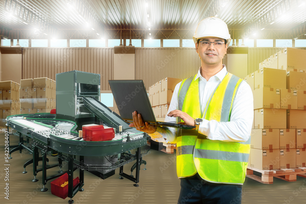 Poster man inside logistics warehouse. worker with laptops smiling. logistic warehouse with conveyor. wareh