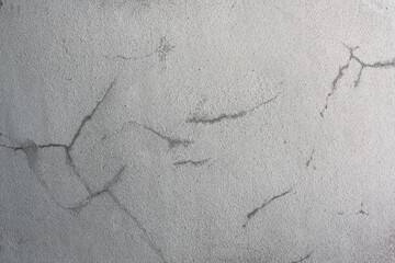 Old cement wall has cracks texture background.