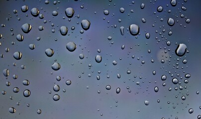 Window glass with condensation natural water drops on window glass.