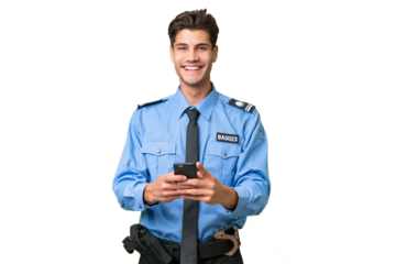 Young police man over isolated background sending a message with the mobile