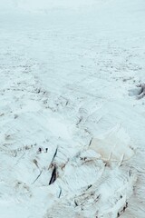 Mountain range and rocky landscape covered with snow and ice