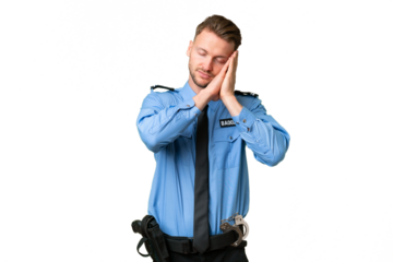 Young police man over isolated background making sleep gesture in dorable expression