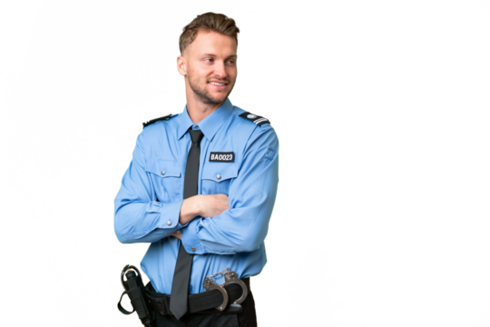 Young police man over isolated background with arms crossed and happy