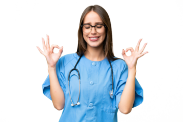 Young nurse caucasian woman over isolated background in zen pose