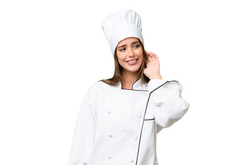 Young chef caucasian woman over isolated background thinking an idea