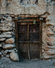 Old wooden door in ancient walled capital city of Lo Manthang, Upper Mustang, Nepal, Himalayas