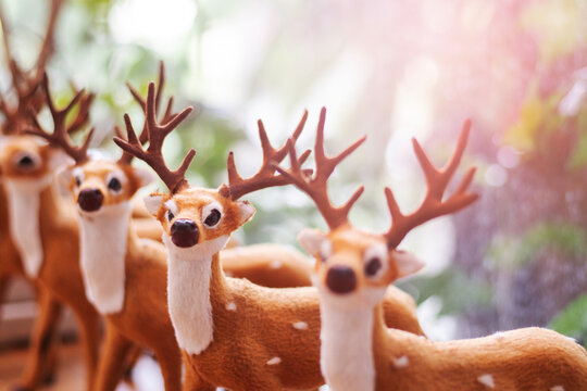 Lots of Christmas deer dolls.