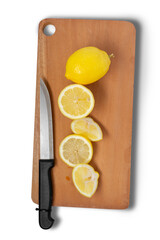 Lemon slices on cutting board isolated on white background. Clipping path.