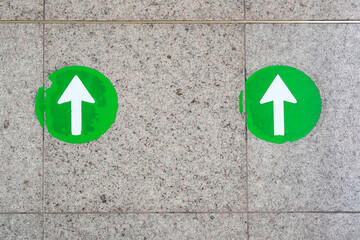 Green arrow pointing to the top