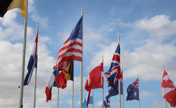 international flags flying during the international meeting