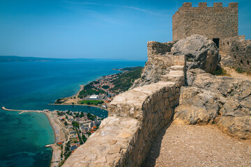Fototapeta na wymiar Omis cityscape view from the Tvrdava Starigrad fortress, Dalmatia, Croatia