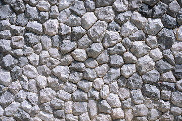 Different shapes of brick walls, Gray stone background.