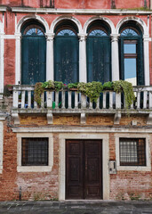 Fototapeta na wymiar charming and colorful facade of a building in Venice, Italy