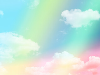 Obraz na płótnie Canvas beauty sweet pastel blue yellow colorful with fluffy clouds on sky. multi color rainbow image. abstract fantasy growing light