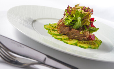 Salad zucchini raw fish with vegetables, testy food
