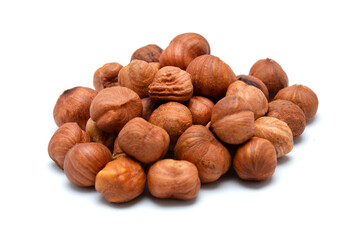 Beautiful toasted hazelnuts isolated on a white background