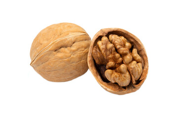 Walnut in a shell isolated on a white background. A nut broken into two parts with a kernel inside