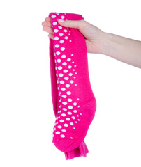 Baby pink tights in hand on white background isolation