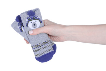 Warm winter children's socks in hand on white background isolation