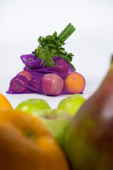 Fabric mesh for fruits and vegetables on a white background. A reusable alternative to plastic bags.