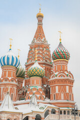 Fototapeta na wymiar Snowy Saint Basil's Cathedral in winter Moscow 