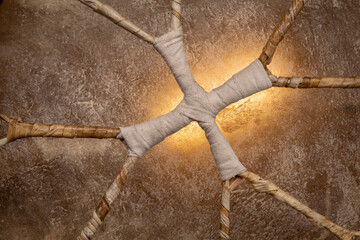 inside detail of a handmade, native American style, shaman frame drum covered by goat skin,...