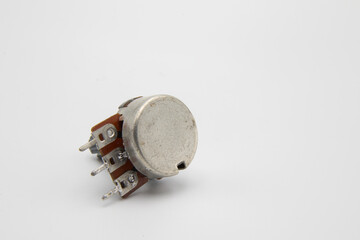 Close-up potentiometer on white background, isolated.