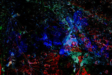 Space abstraction. Colorful spheres are illuminated by flashes of green-red-blue lights and are located against a black background. 3D render.
