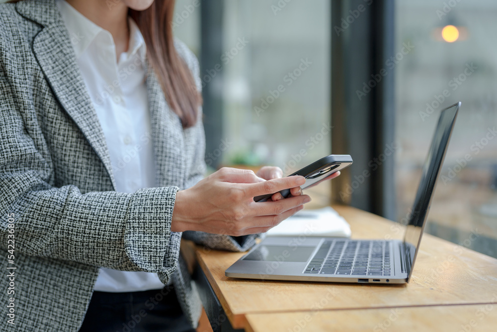 Poster close-up of a woman using a smartphone to do business with customers via messaging app line, conduct